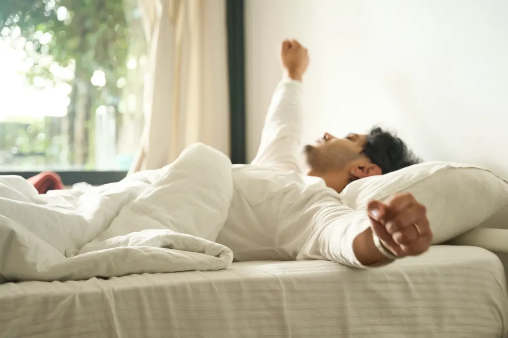 Man waking up in morning